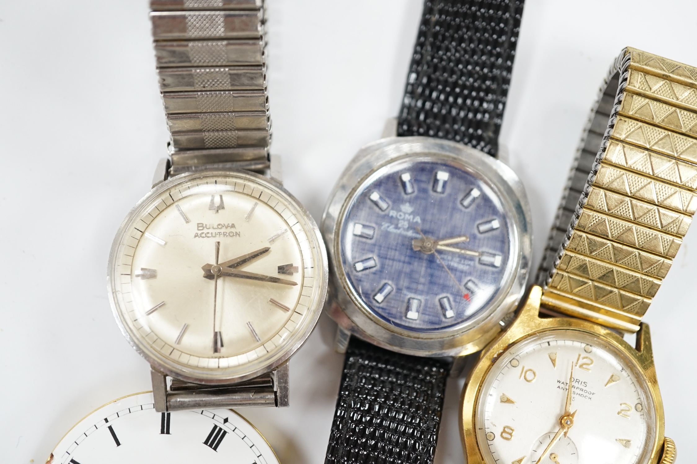 A gentleman's stainless steel Bulova Accutron wrist watch, on associated flexible strap, two other gentleman's wrist watches including Oris and a J.W. Benson pocket watch movement.